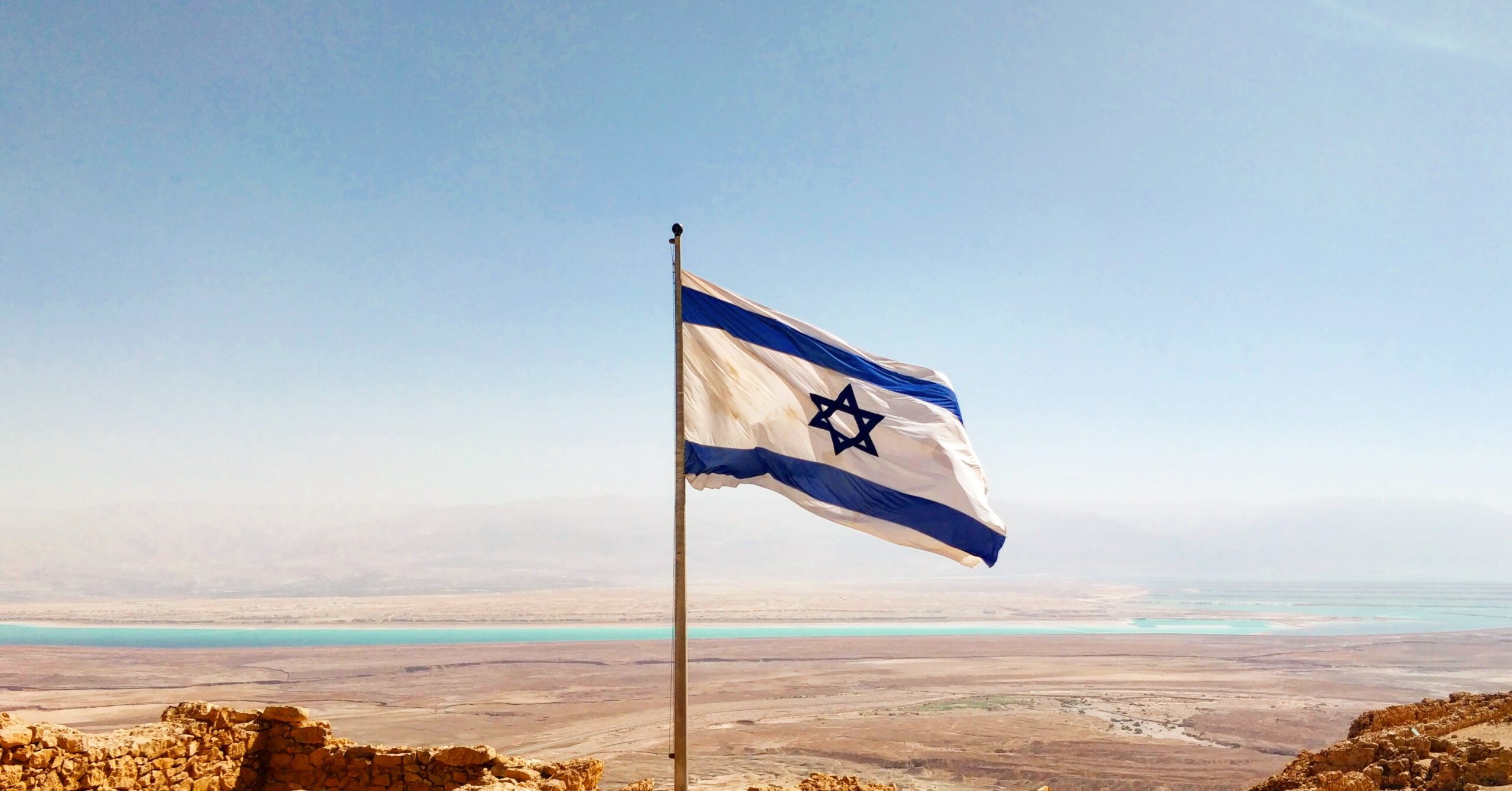 Israel flag in front of landscape
